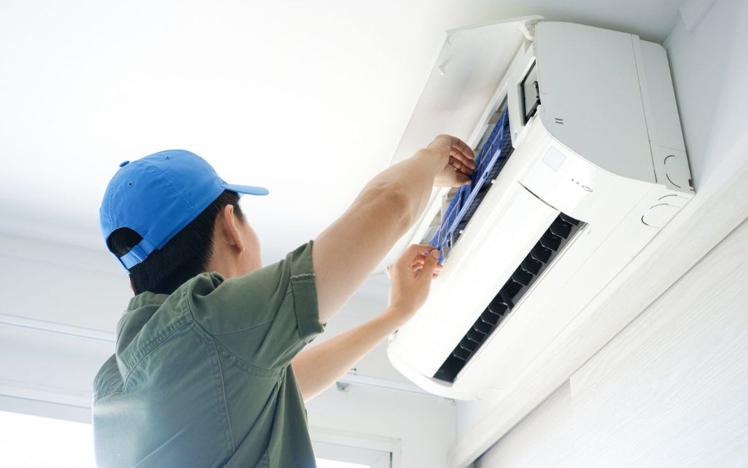 HVAC technician servicing a ductless mini split in Diamond Bar