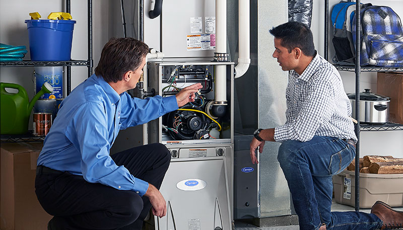 Technician evaluating a furnace for repair or replacement in Diamond Bar